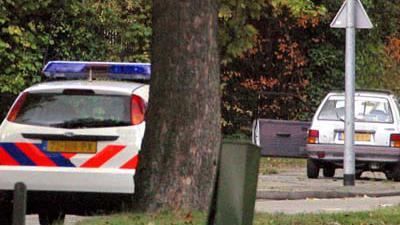 Foto van politieauto en personenauto | Archief EHF