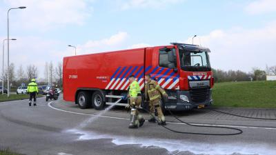 Brandweer spuit wegdek schoon