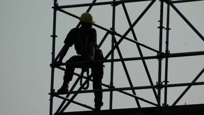 Foto van bouwvakker op steiger | Archief