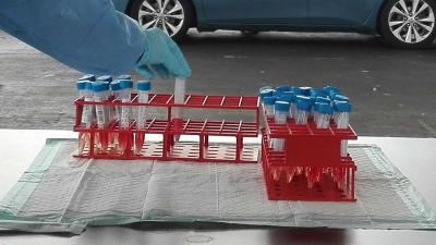 teststraat-ggd-monster-swab-auto